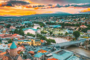 Tbilisi, Georgia. Evening View Of Tbilisi Skyline At Colorful Sunset. Summer Cityscape